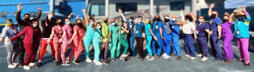 Photo of Immunization group in colorful scrubs
