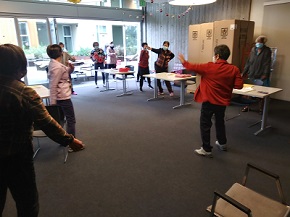 Photo of participants exorcising at a bingocize session