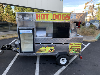 A towable hot dog cart