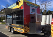 A towable full-sized food cart