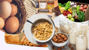 Image of eggs, cereal, fruits and vegetables, bread, milk, nuts, and beans.
