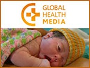 An image of an infant lying down with the header Global Health Media. 