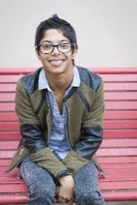 Picture of a boy sitting on a bench